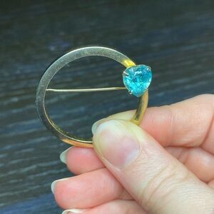 Vintage Gold Tone Circle Brooch with Blue Heart